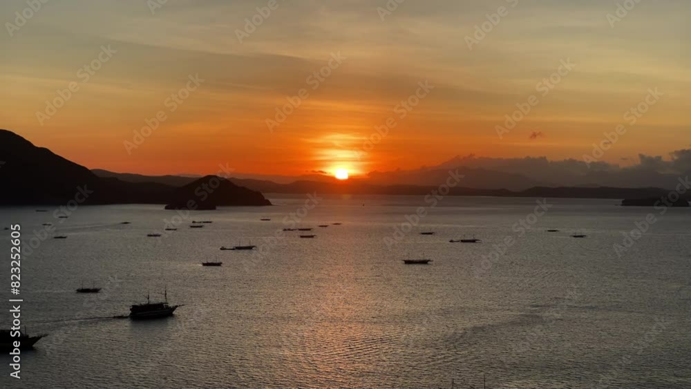 orange sunlight rising with a clear sky and boat on the sea orange sunlight rising with a clear sky and boat on the sea