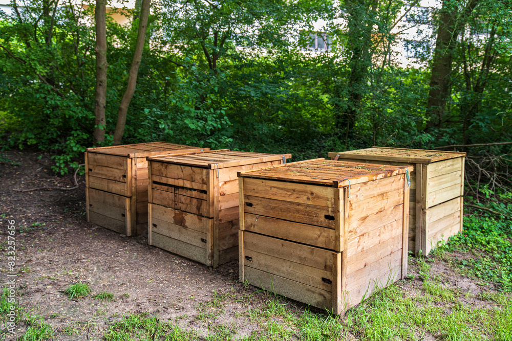 Collective wooden compost bins for food and vegetable waste Collective wooden compost bins for food and vegetable waste