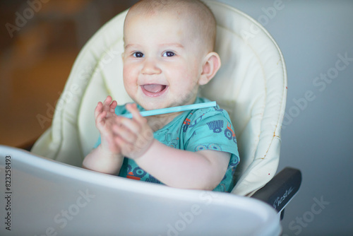 A baby is a happy baby in the first months of life, crawling around the house, smiling.