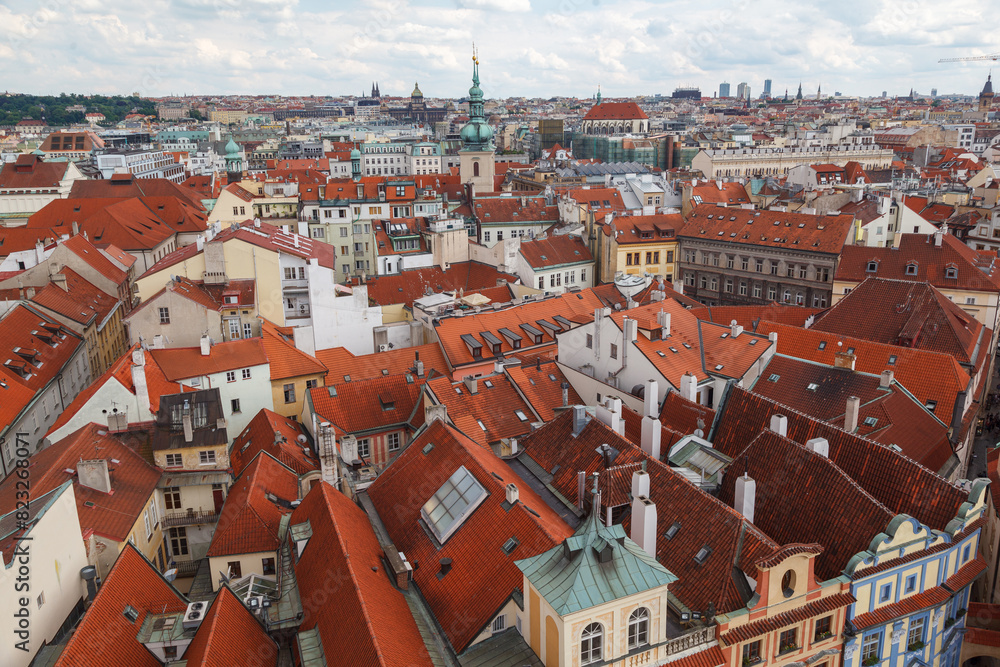 Obraz premium Aerial view of the rooftops of the historical buildings in Prague, Czech Republic
