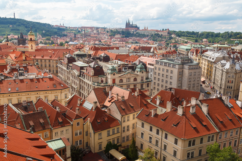 Obraz premium Aerial view of the rooftops of the historical buildings in Prague, Czech Republic