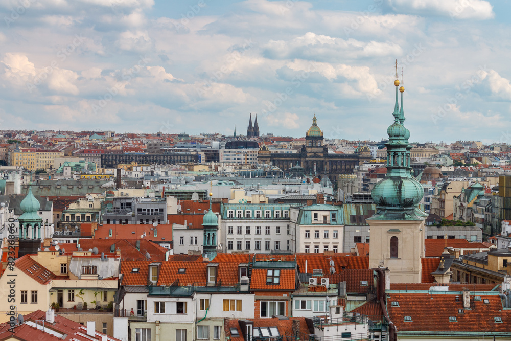 Fototapeta premium Aerial view of the rooftops of the historical buildings in Prague, Czech Republic