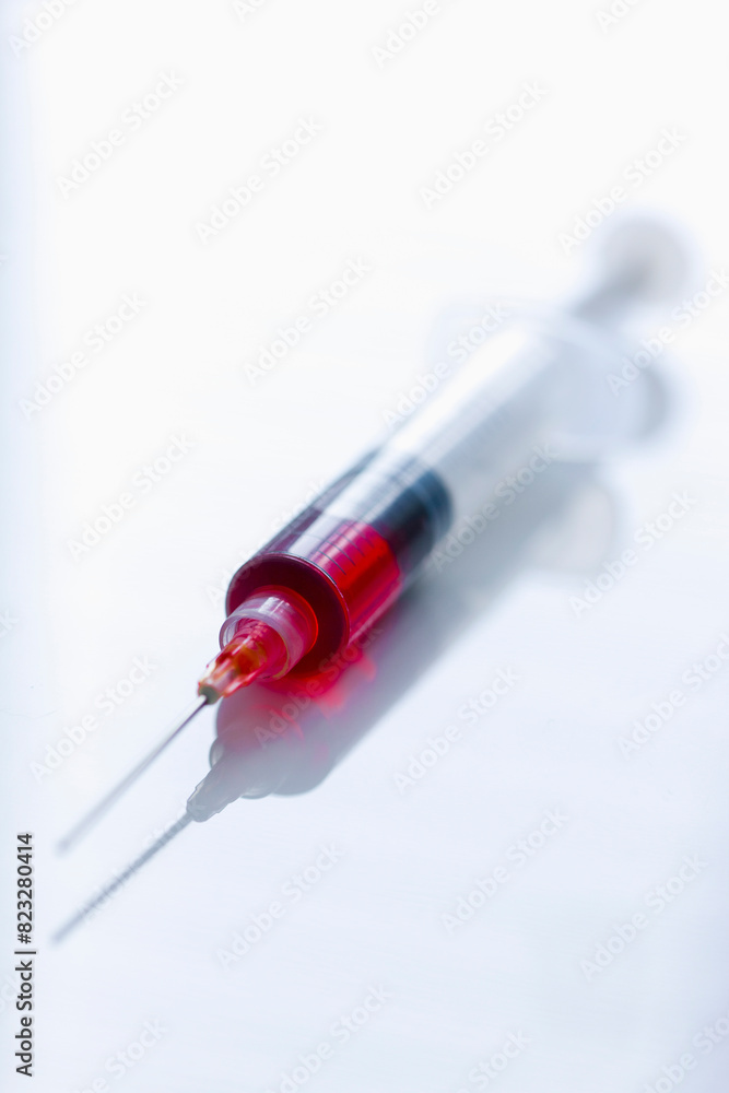 Syringe full of blood Syringe full of blood