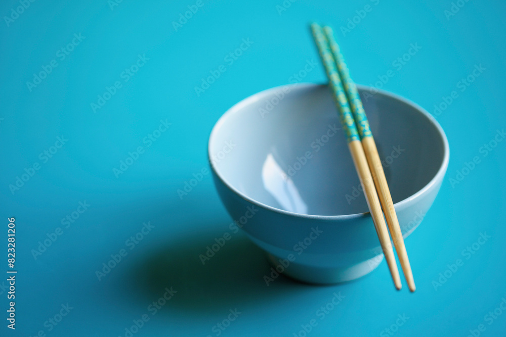 Empty Blue Bowl with Chopsticks
Empty Blue Bowl with Chopsticks