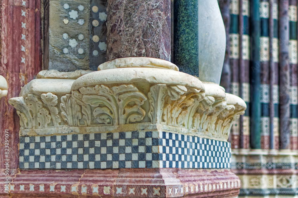 Details at facade of Genoa Cathedral or Metropolitan Cathedral of Saint Lawrence in Genoa, Italy.