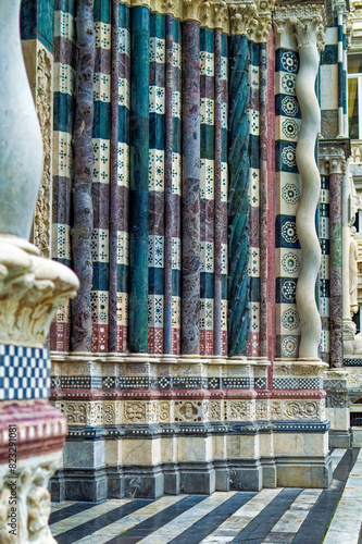 Details at facade of Genoa Cathedral or Metropolitan Cathedral of Saint Lawrence in Genoa, Italy.