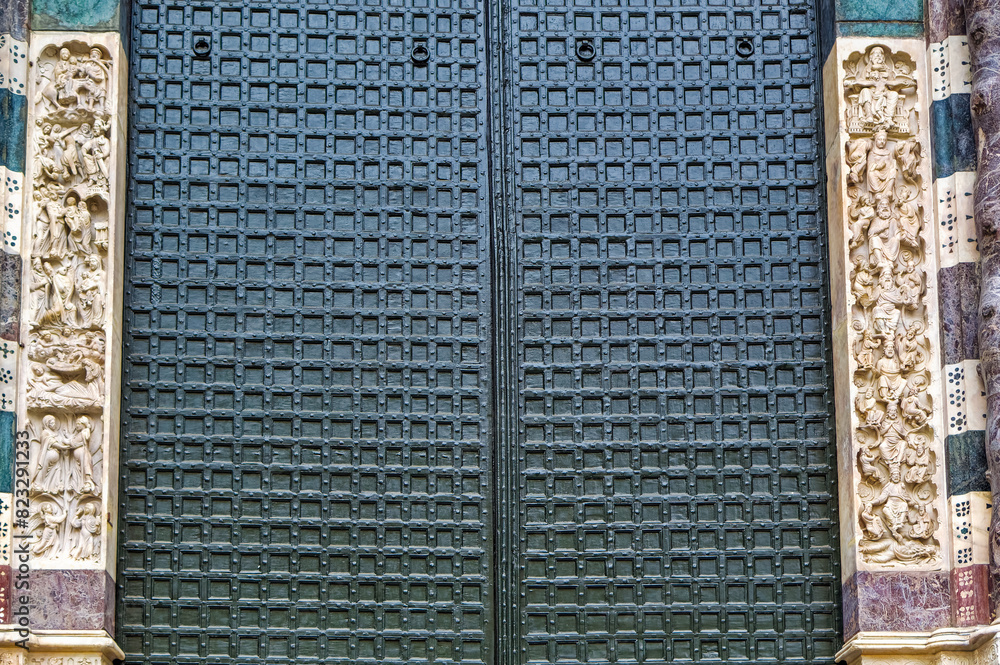 Details at facade of Genoa Cathedral or Metropolitan Cathedral of Saint Lawrence in Genoa, Italy.