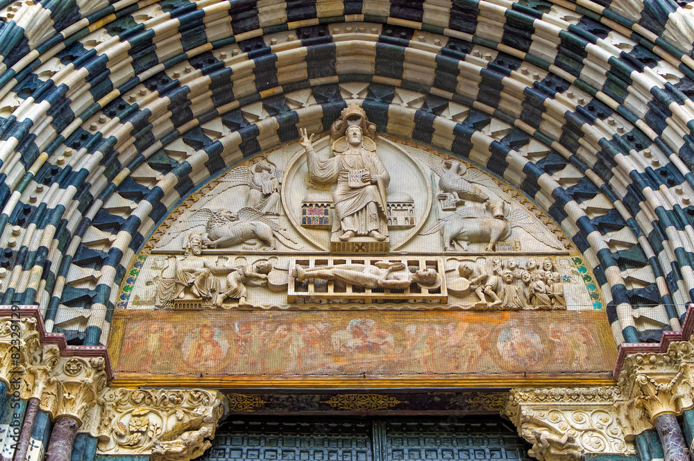 Details at facade of Genoa Cathedral or Metropolitan Cathedral of Saint Lawrence in Genoa, Italy.