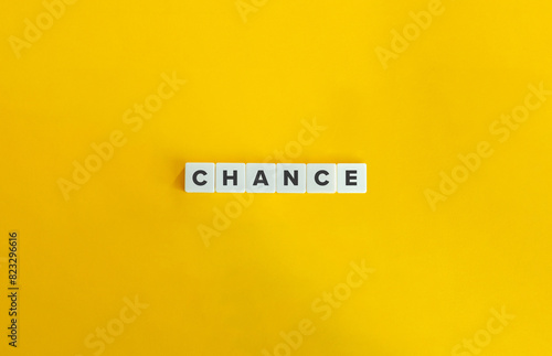 Chance Word. Concept of Opportunity, Possibility, Prospect, Likelihood, Probability. Text on Block Letter Tiles on Flat Background. Minimalist Aesthetics. photo
