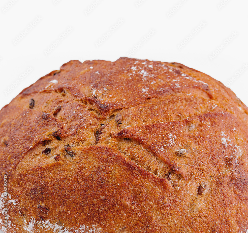 Freshly baked round artisan bread on white background