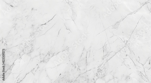 A high-resolution texture of light grey marble, suitable for use as an overlay on graphic design or web development projects photo
