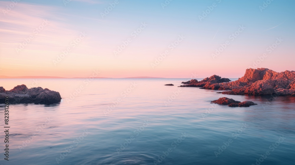 Obraz premium Peaceful bay at sunrise, calm waters.