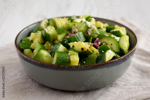 Homemade Smashed Cucumber Salad in a Bowl, side view.
