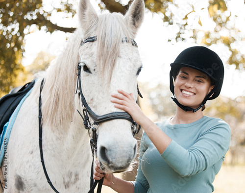 Portrait, horse or happy woman in countryside with jockey or rider for outdoor hobby, sports or wellness. Love, smile or girl athlete with healthy animal for training, exercise or support on farm © peopleimages.com