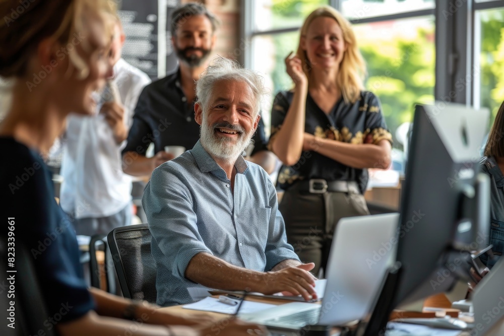 Group of business people working together in a modern office. Selective focus. Group of business people working together in a modern office. Selective focus.
