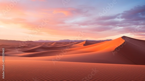 Fototapeta Naklejka Na Ścianę i Meble -  Panoramic sunset over desert sand dunes.