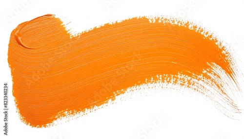 Vibrant orange brush stroke on white background photo