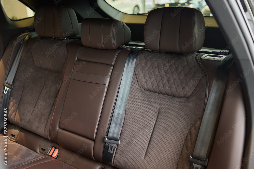 Car back seat with headrest and arm rest, a comfortable automotive fixture Car back seat with headrest and arm rest, a comfortable automotive fixture