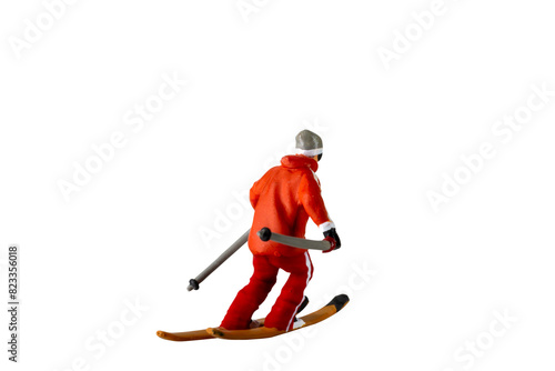 Miniature people , A skier full length Isolated with clipping path