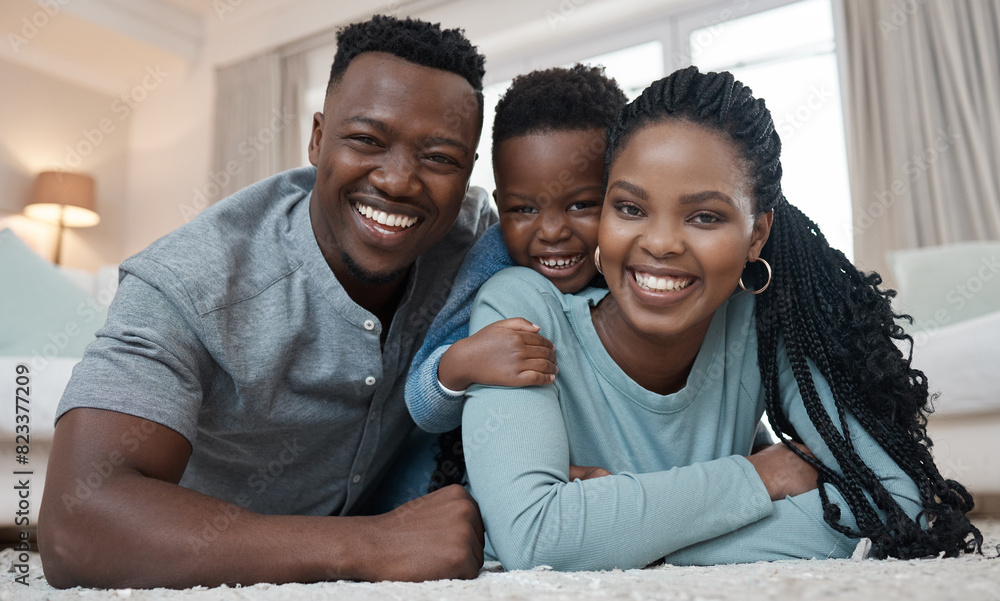 Obraz premium Portrait, black family and happy in house on floor for bonding, love and support with care. People, smile and together with confidence or laugh in living to relax, chill and fun on day off with trust