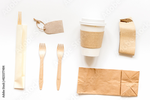 paper bags for food delivery restourant white table background top view mockup photo
