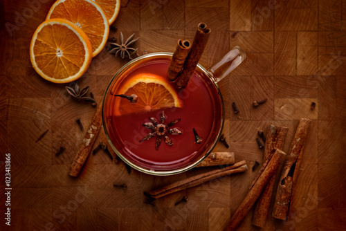 Принти на полотні Top view of a pot of mulled wine on a rustic wooden table