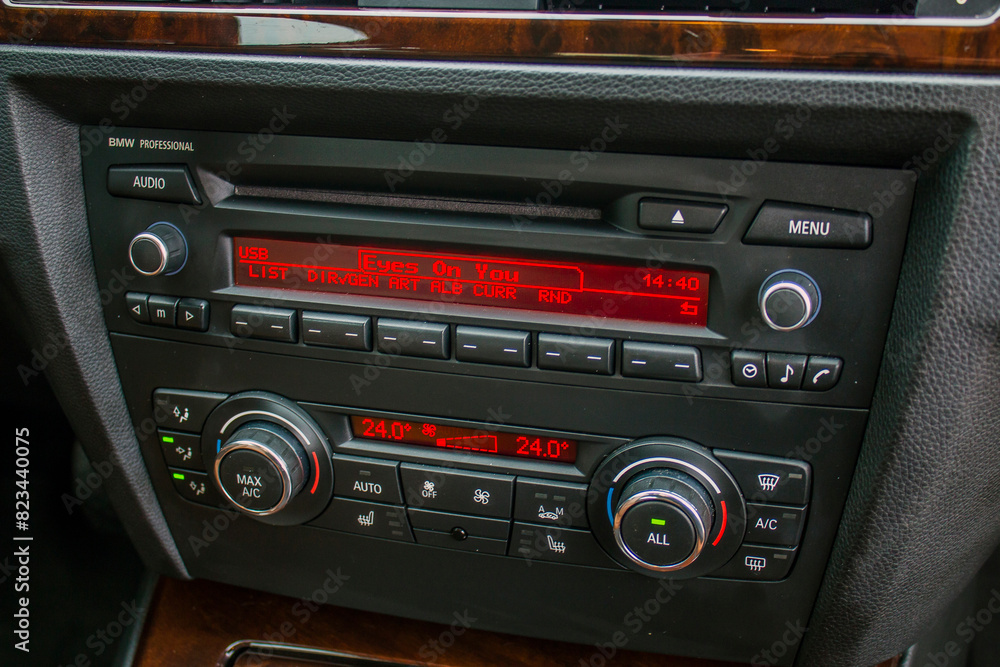 Car radio in car interior with red screens Car radio in car interior with red screens