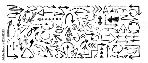Hand drawing charcoal arrow set. Doodle direction pointer, curved strokes, cursor, dashed, circular and wave arrows. Black chalk pencil dash lines. Grunge crayon scribbles, scrawls painted with coal.