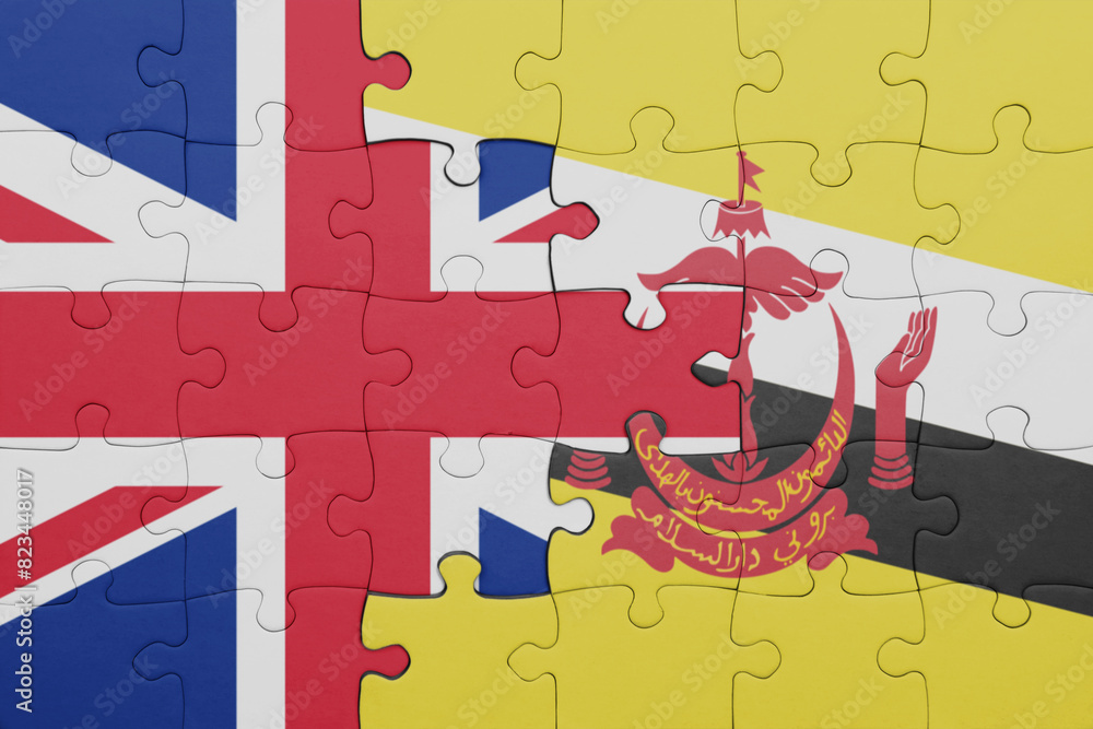 puzzle with the colourful national flag of brunei and flag of great britain. puzzle with the colourful national flag of brunei and flag of great britain.