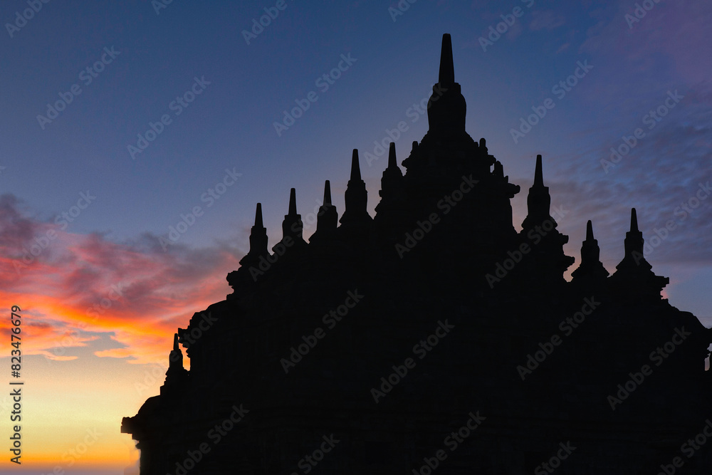 Beautiful colors of morning sky over silhouette of Plaosan temple in Yogyakarta
