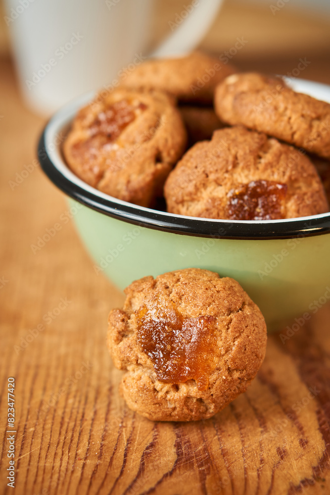A bowl with pepas cookies on a table A bowl with pepas cookies on a table