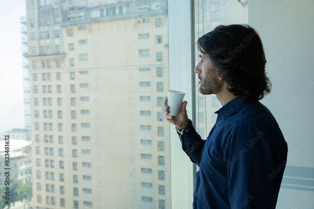 View of a young man with smartphone View of a young man with smartphone