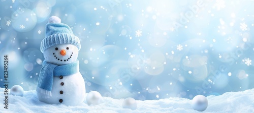 Festive snowman closeup on snowy background   winter holiday banner with copy space photo