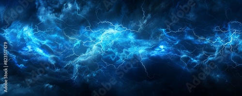 Dramatic blue lightning bolts illuminate dark night sky, perfect for backgrounds, wallpapers, and weather-related themes. © Rattanathip