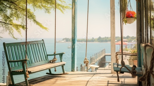wooden porch swing swaying gently in the breeze  against the background of a traditional pier and a beautiful fisherman