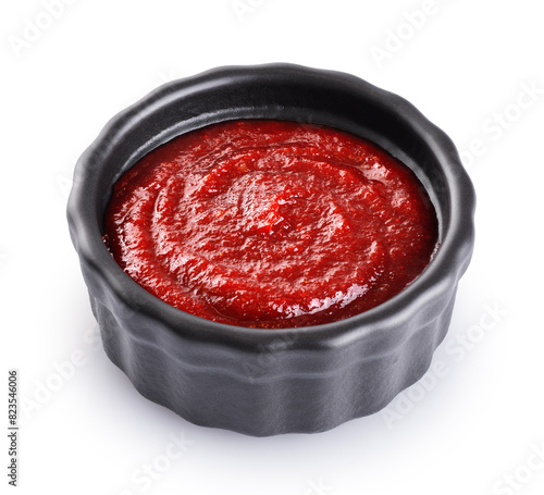 Gochujang Korean traditional spicy fermented sauce in a bowl isolated on white background. With clipping path.