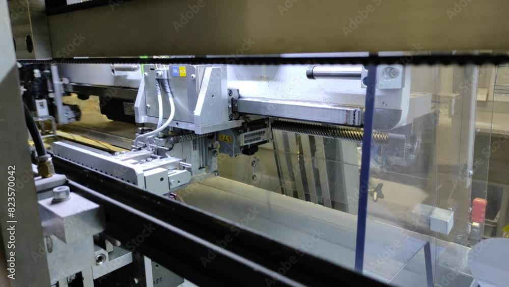 industry. Production of auto wiring. Robots are automated industry. Production of auto wiring. Robots are automated