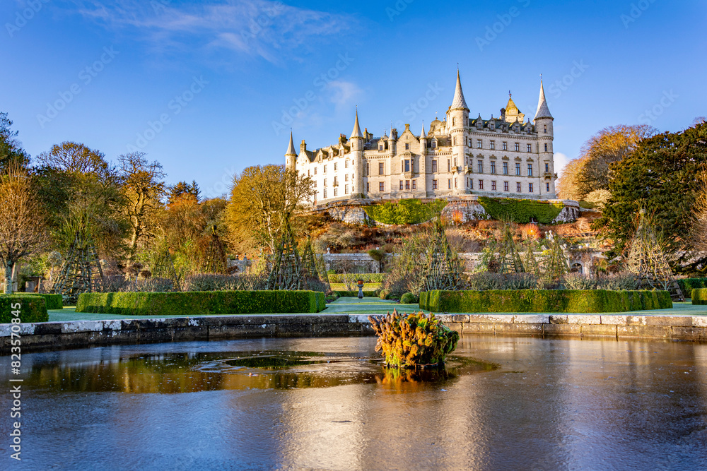 Dunrobin Castle at the Scottish Highlands in cold sunny winter day with clear blue sky Dunrobin Castle at the Scottish Highlands in cold sunny winter day with clear blue sky
