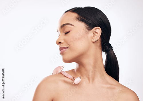 Tableau sur toile Skincare, derma roller and model in studio for anti aging, cosmetic or face massage on white background