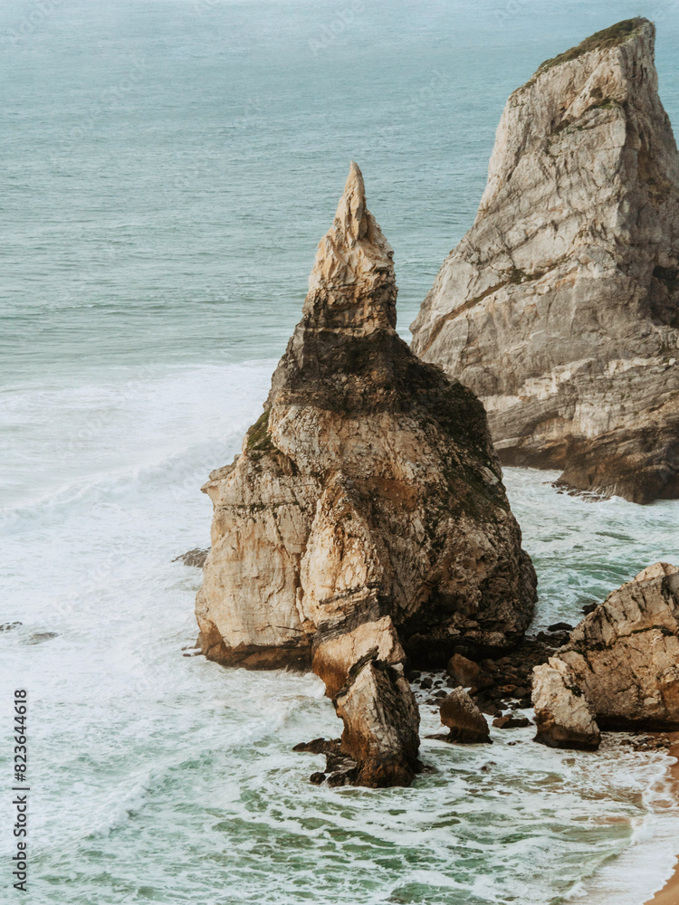 View from the observation deck of impressive sea cliffs rising from the ocean