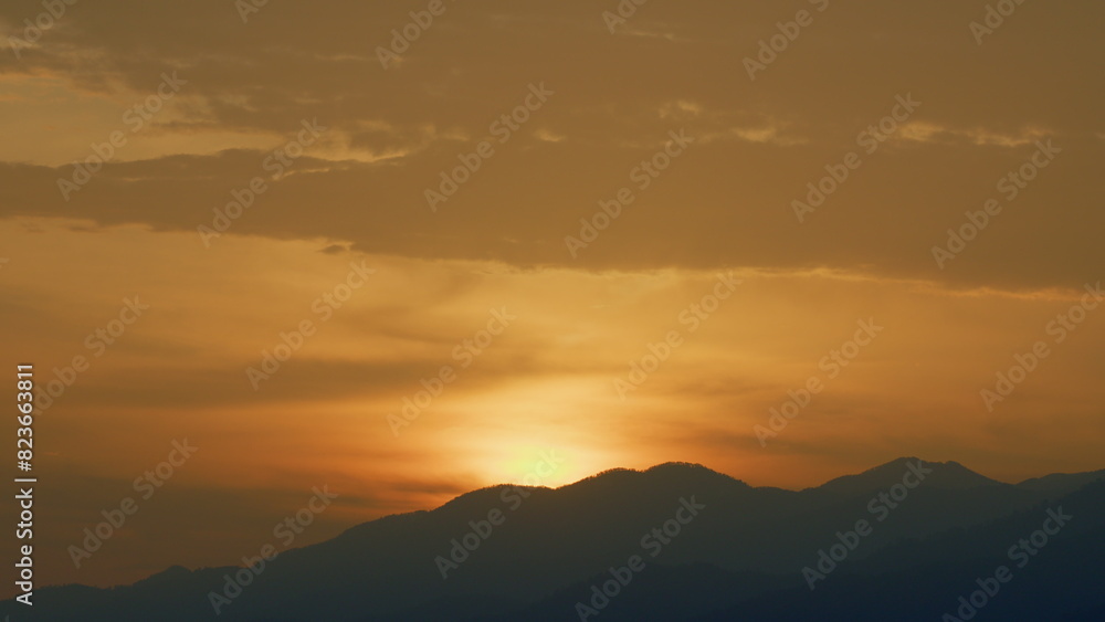 Sunrise In Mountains. Golden Gradient Background. Sunrise In The Morning. Real time.
