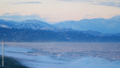 Mountain Slopes With Hotels And Houses. City Coast With Calm Black Sea. Georgia  Europe. Static view.