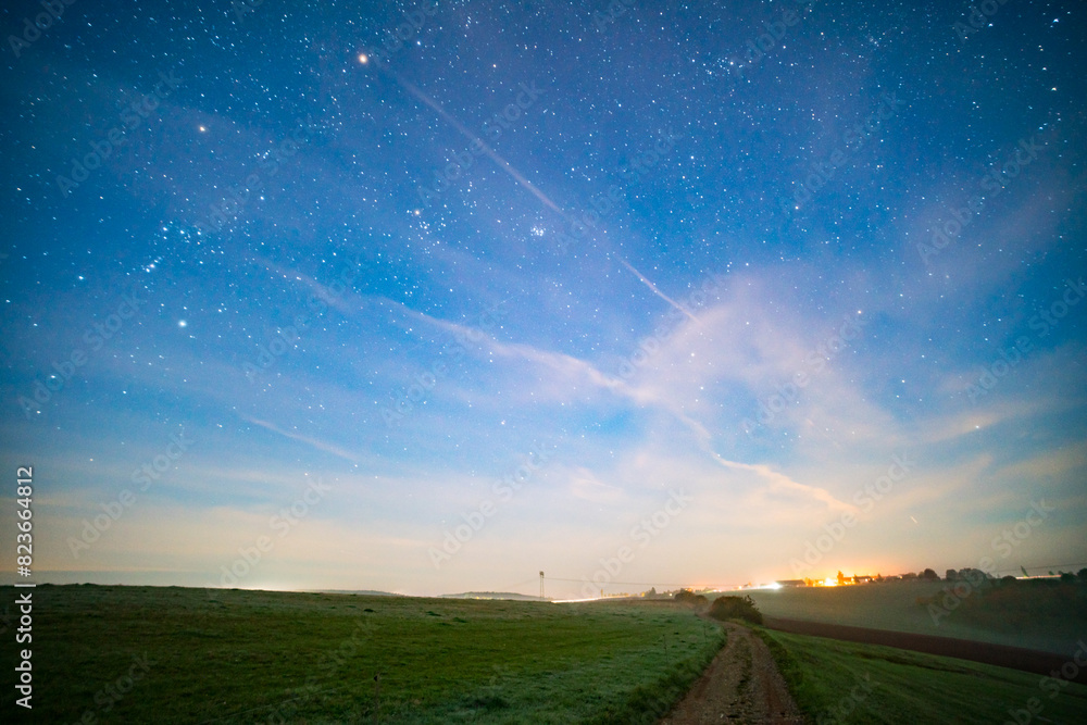 panorama of a rural night landscape with a view of the stars panorama of a rural night landscape with a view of the stars