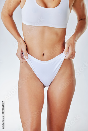 Body, underwear or model on diet for abdomen, nutrition or natural wellness isolated on white studio background. Weight loss, health or stomach skin of slim woman in panties for cellulite liposuction