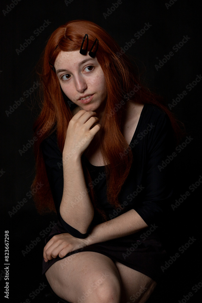 portrait photographs of a beautiful redhead woman on black background portrait photographs of a beautiful redhead woman on black background