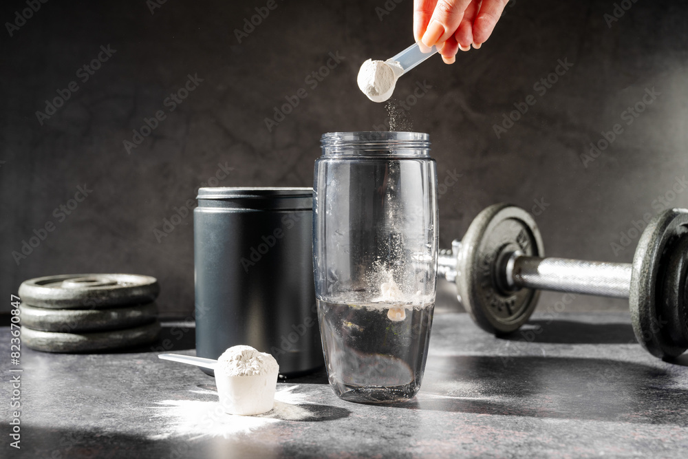 Φωτογραφία Amino acid food supplement, creatine powder in a measuring scoop, Sports nutriti