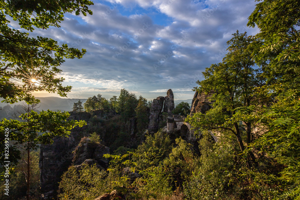 Landscape shot in the morning in a rocky landscape. On and around the Bastei Bridge in the Elbe Sandstone Mountains near Dresden, Saxony, Germany Landscape shot in the morning in a rocky landscape. On and around the Bastei Bridge in the Elbe Sandstone Mountains near Dresden, Saxony, Germany