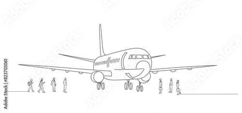 A group of people are standing in front of an airplane