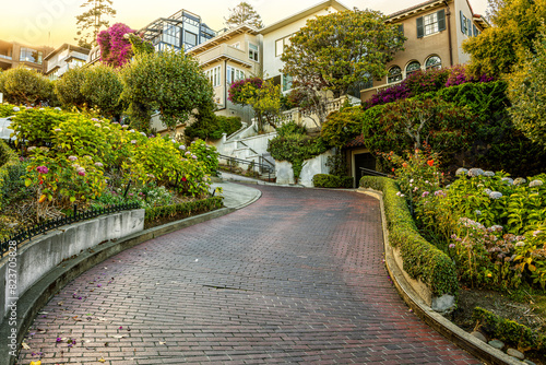 The crookedest street in the world lightened by sunset. Lombard Street. San Francisco, CA. photo