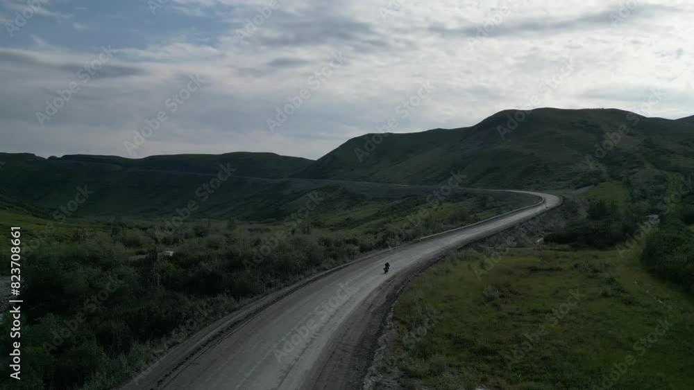 Motorcycle Riding in Mountain Dirt Road in Alaska - Drone Footage Motorcycle Riding in Mountain Dirt Road in Alaska - Drone Footage
